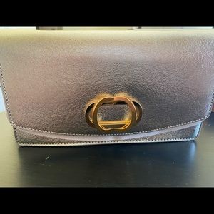 Stuart Weitzman The Emelie Brillante Silver Clutch